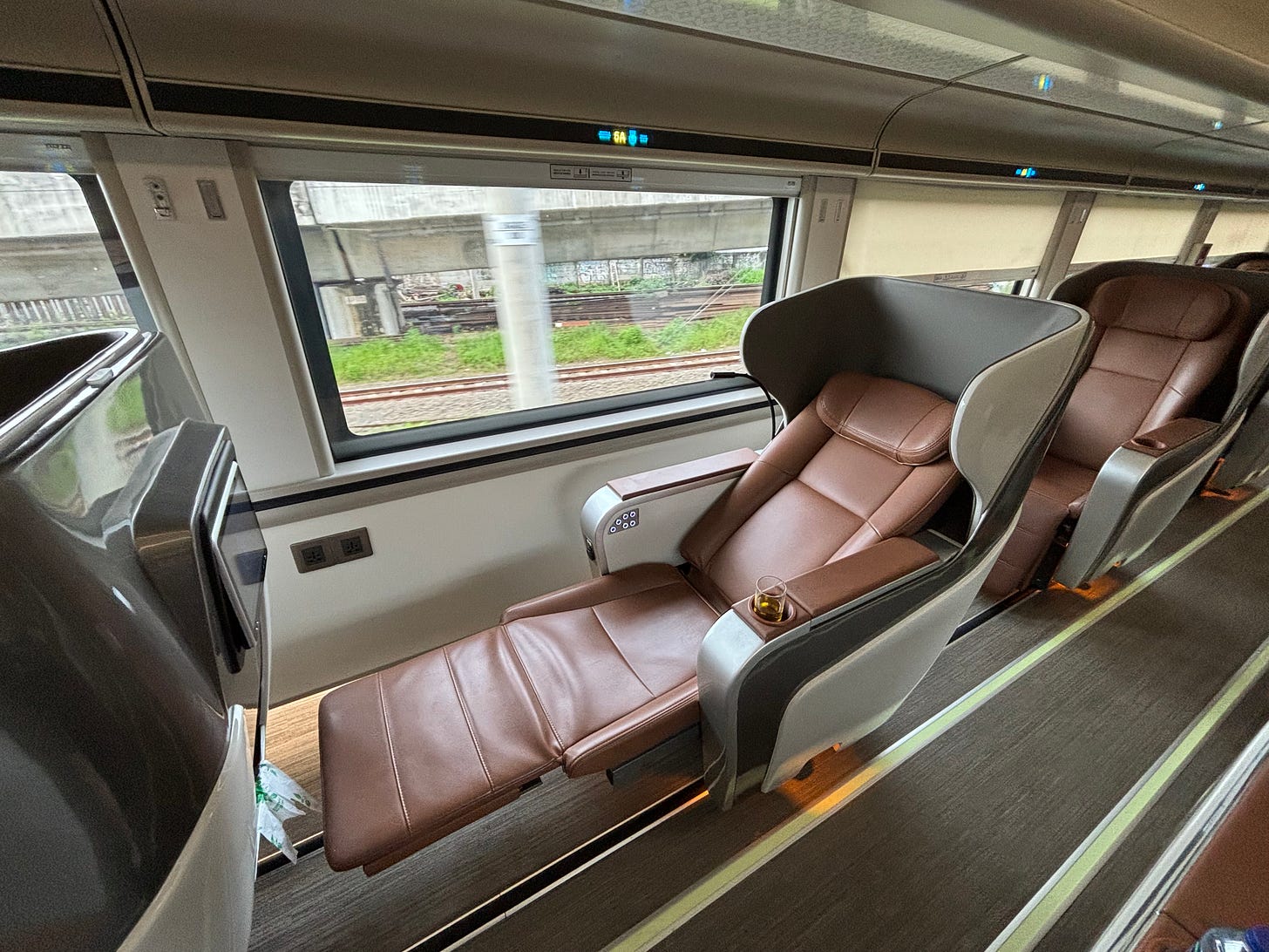 Almost lie-flat seating on an Indonesian train