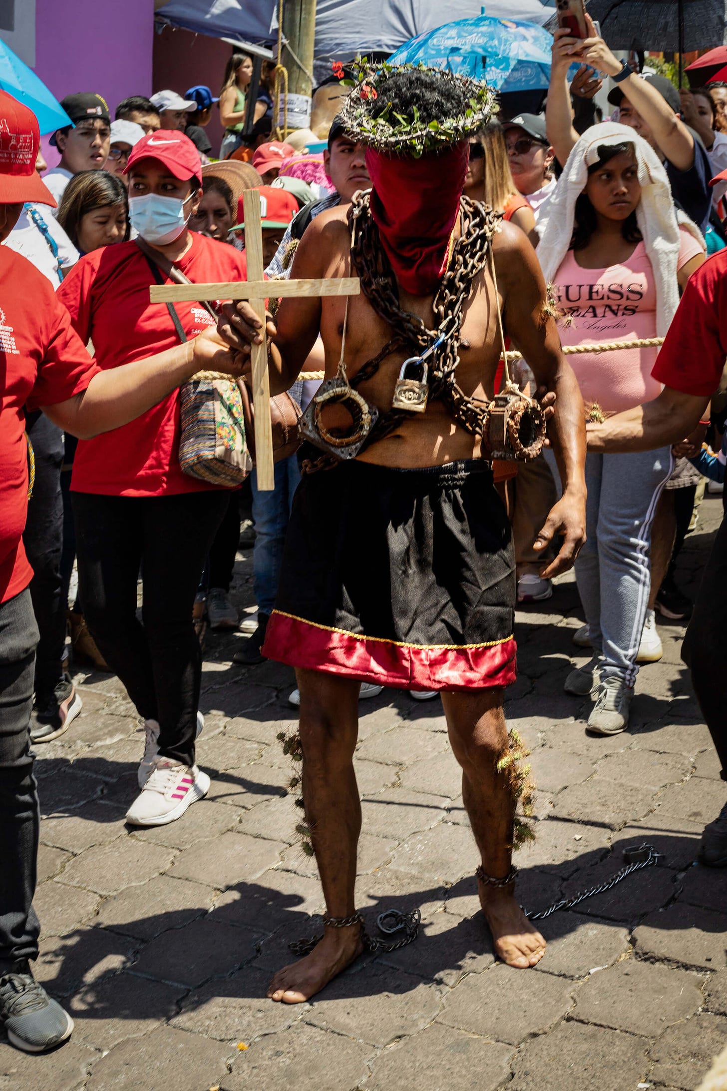 Los Engrillados of Atlixco: Mexican men in shackles with cacti stuck in their skin walk in pain to wash away their sins