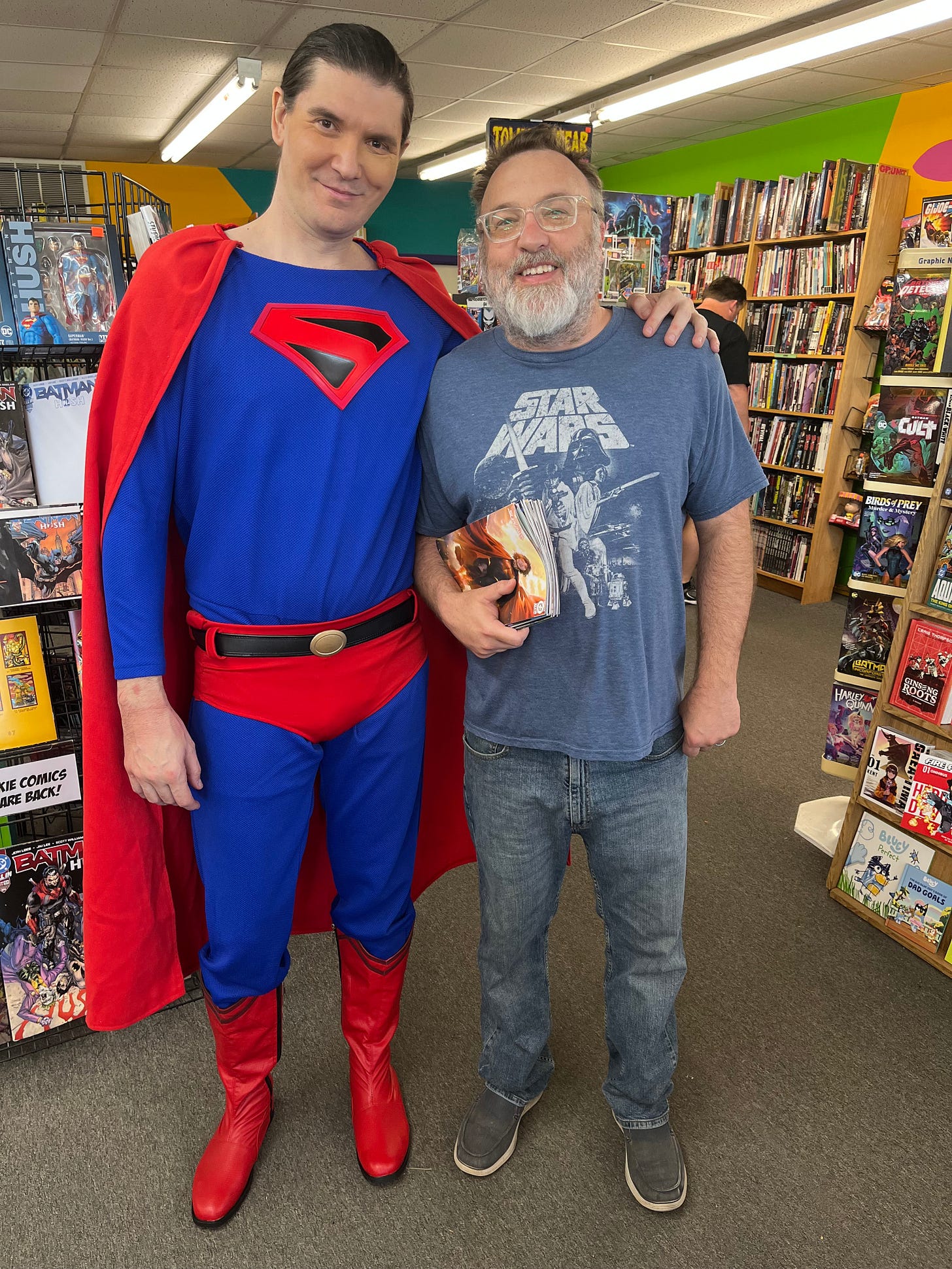 Superman and a comics fan celebrate Free Comic Book Day 2025 at Speeding Bullet Comics in Norman, OK Superman and a comics fan celebrate Free Comic Book Day 2025 at Speeding Bullet Comics in Norman, OK