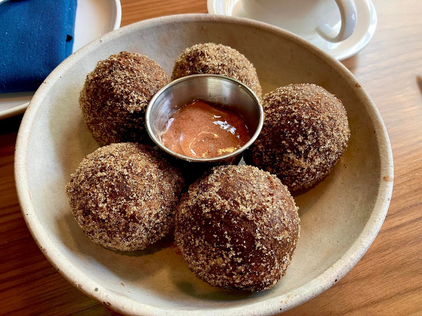 May be an image of scotch egg, croquette and dim sum