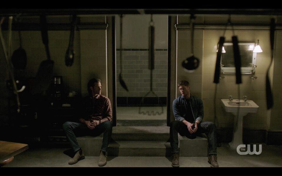 SPN Sam Dean Winchester sitting in kitchen defeated 1519