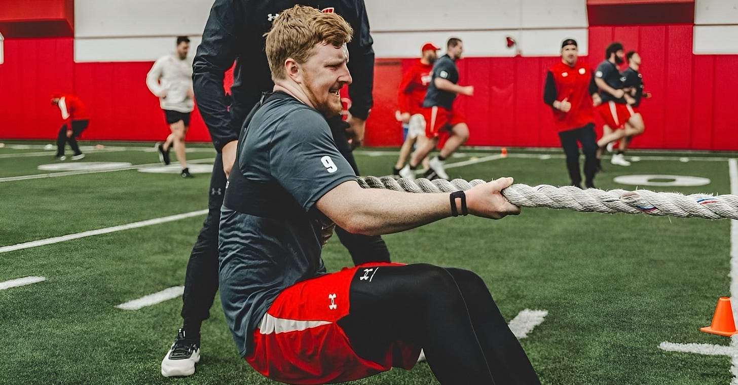 Wisconsin Badgers quarterback Billy Edwards Jr. working out during the offseason 