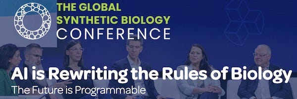 A photo of some people sitting on chairs on a stage, evidently some kind of panel. Printed over the image, these words: "The Global Synthetic Biology Conference. AI is rewriting the rules of biolgy. The future is programmable.