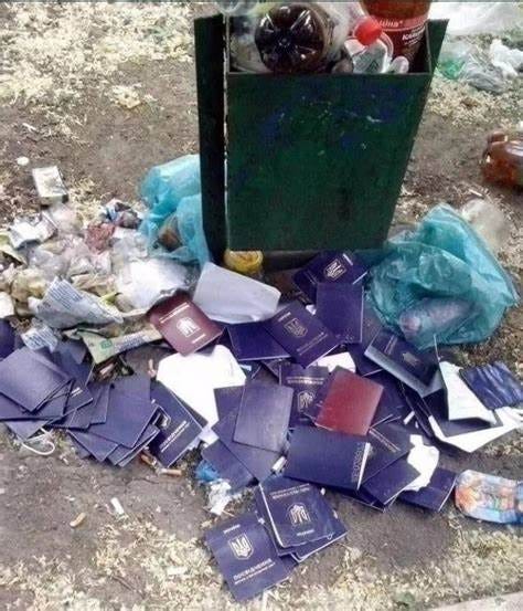 Taurevanime on Twitter: "Ukrainian passports being thrown away in large ...