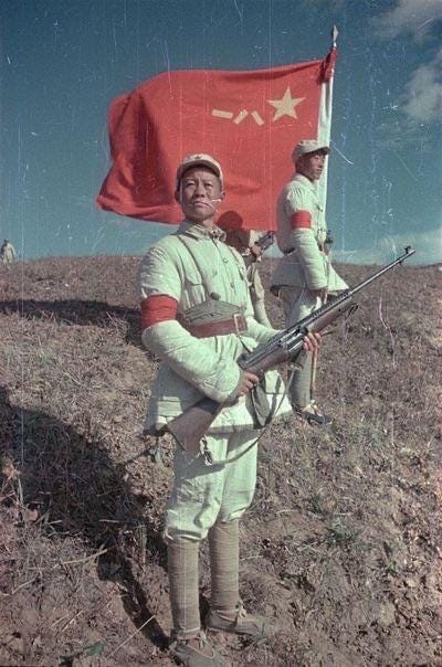 r/HistoryPorn - PLA soldier carrying a captured M1941 Johnson rifle in the Chinese Civil War. 1949 [400x604] [Colorized]