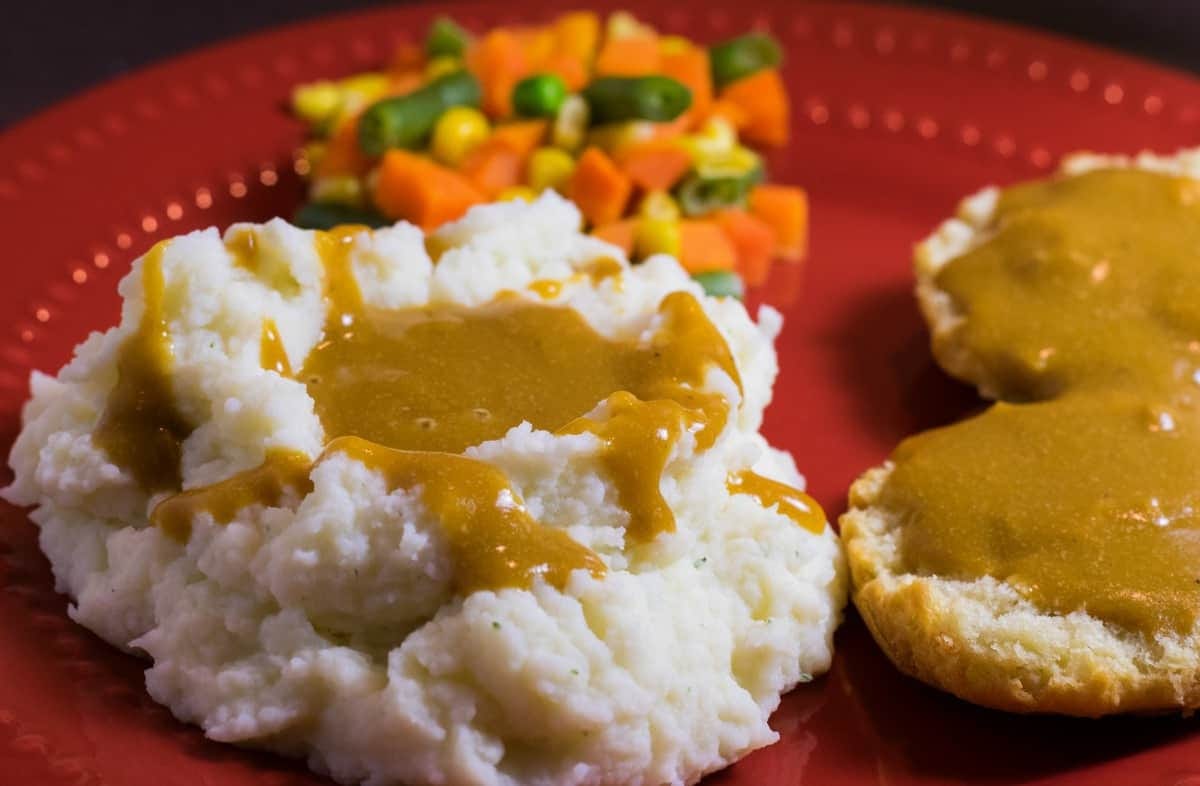 original recipe photo of mashed potatoes and my best vegan gravy