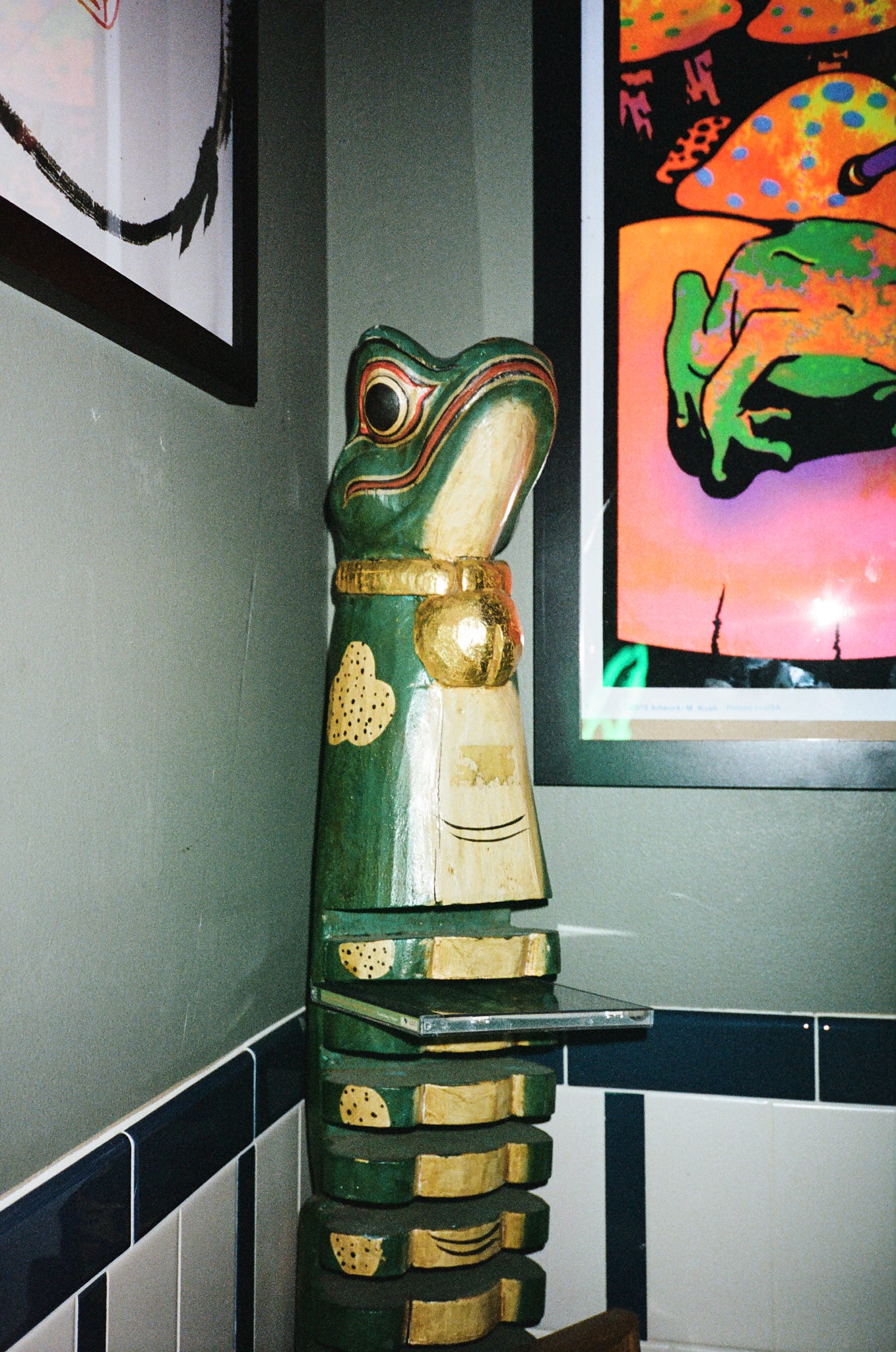 A frog figurine inside Pinyon's bathroom