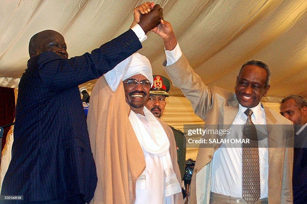 Sudanese President Omar al-Beshir (C), f