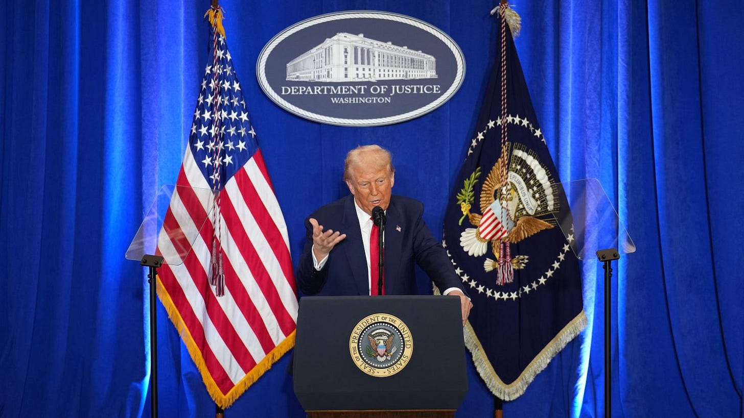 US President Donald Trump speaks at the Justice Department in Washington, DC, on Friday.