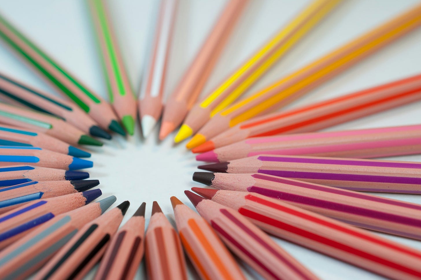 a circle of colored pencils