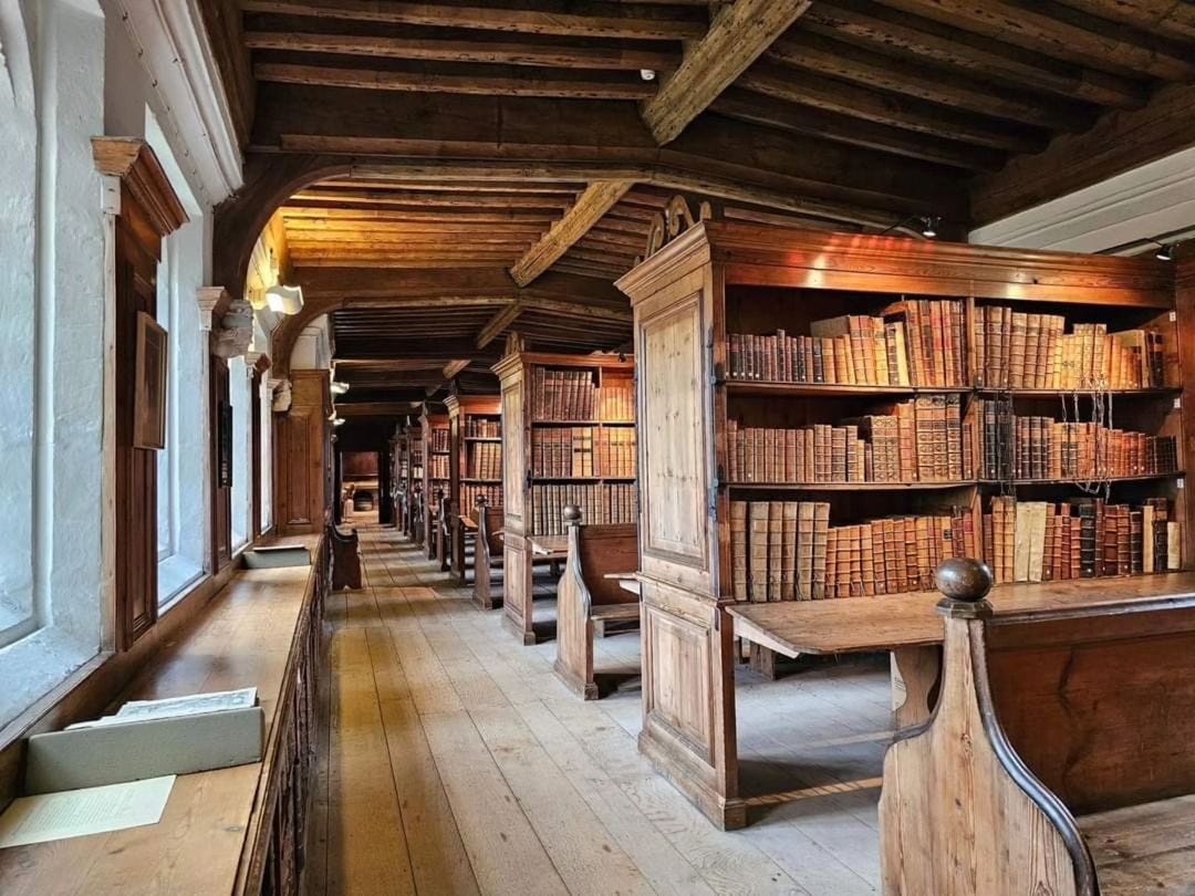 Wells Cathedral’s Chained Library: “Our Chained Library houses books published before 1800 which were collected by the canons in the 16th, 17th and 18th centuries, reflecting their wide-ranging intellectual interests.” Caption and photo from Wells Cathedral.