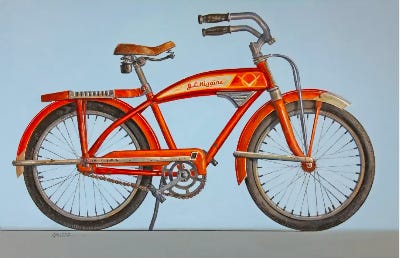An orange bicycle with a white background

Description automatically generated