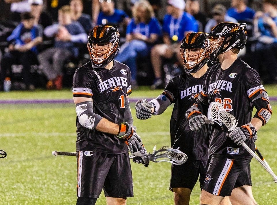 Denver Outlaws players Logan Wisnauskas, Brennan O’Neil and Same Handley. Denver Outlaws players Logan Wisnauskas, Brennan O’Neil and Same Handley.