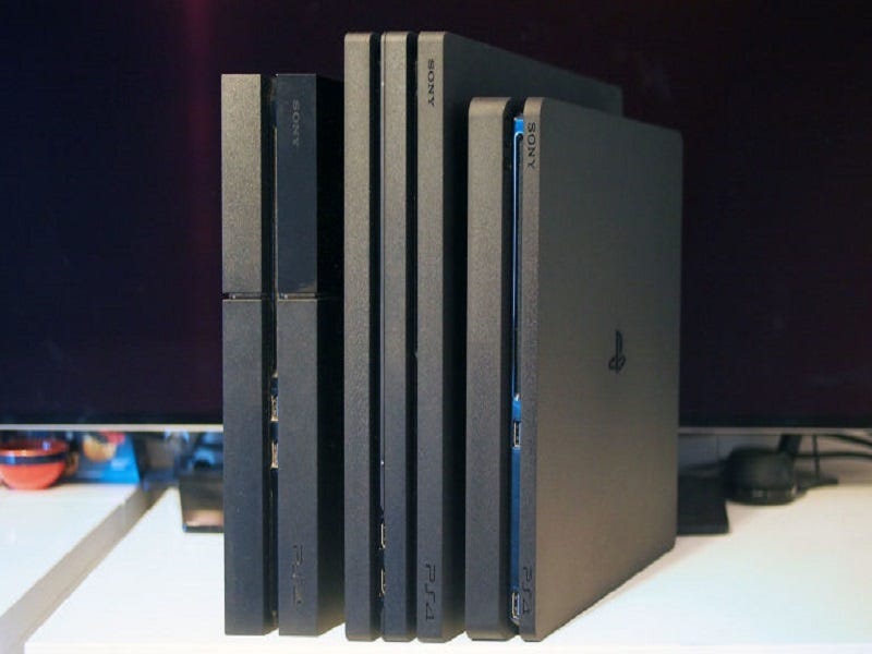 sony ps4 consoles next to each other