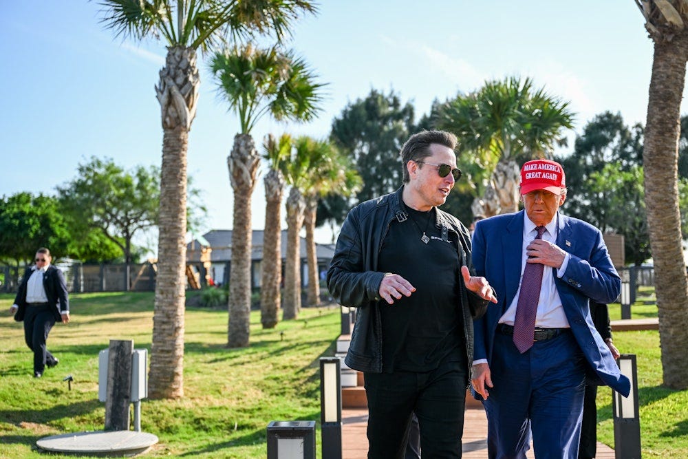 Elon Musk greets Donald Trump as he arrives to attend a viewing of the launch of the sixth test flight of the SpaceX Starship rocket.