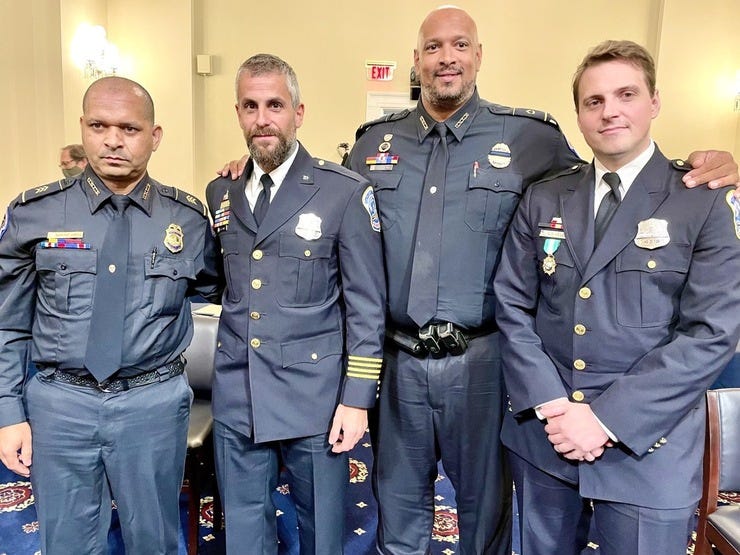 Capitol Police Officers were honored by the President. From left. Aquilino Gonell, Michael Fanone, Harry Dunn, and Daniel Hodges.