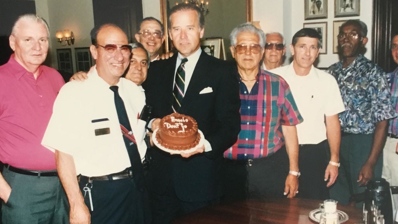 Angelo Negri poses with then-Senator Joe Biden at a retirement party.