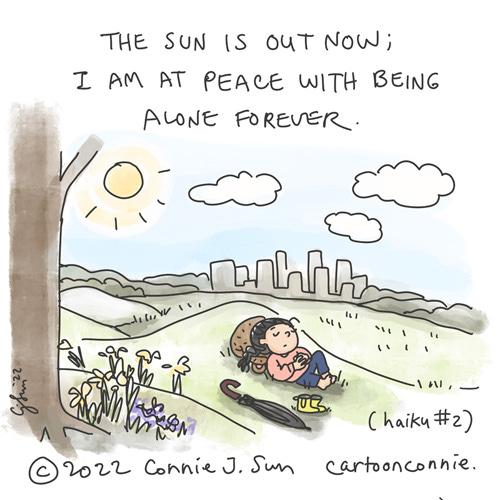 Sun Is Out (Haiku #2) Single-panel cartoon of a girl with a braid, napping barefoot on a grassy lawn, under blue skies on a sunny spring day. Yellow galoshes are off and umbrella is folded. Cartoon text is a haiku: "The sun is out now; / I am at peace with being / Alone forever." Haiku # 2 in a series. Comic illustration by Connie Sun, cartoonconnie, 2022.