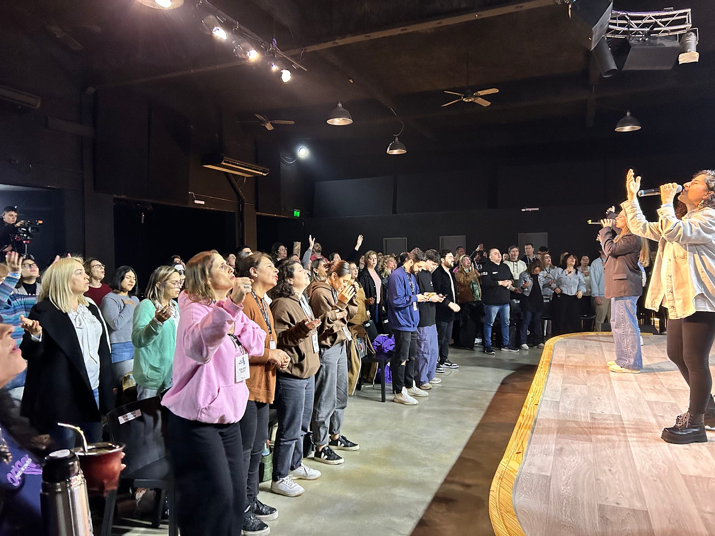 Photo of people worshiping during a church service