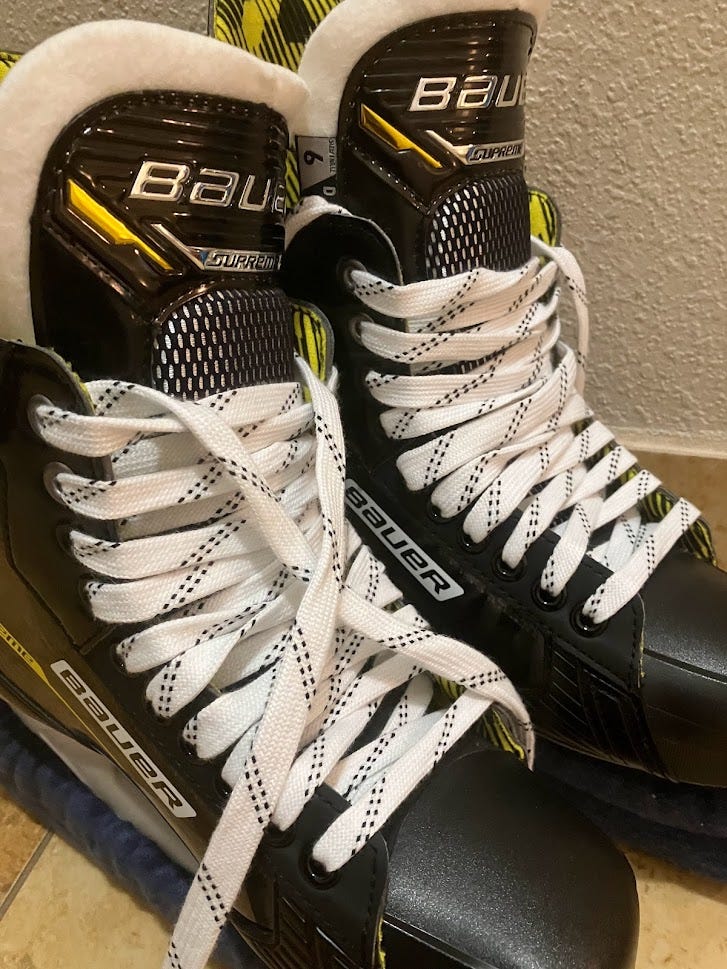 A pair of Bauer hockey skates, fresh from the box