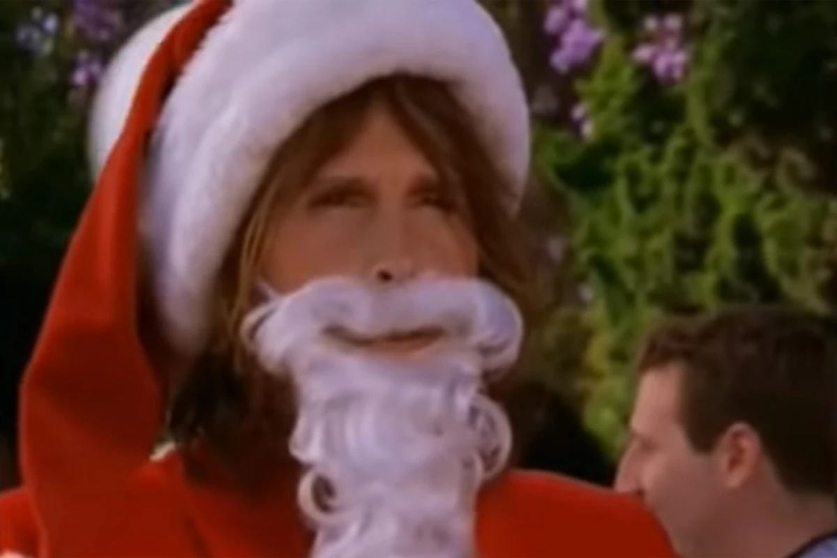 Aerosmith lead singer Steven Tyler is dressed in a Santa hat and beard from the video 'Santa Claus Is Coming to Town’.