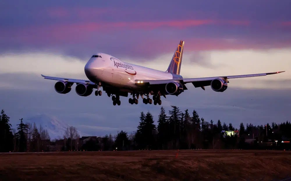 The final Boeing 747 lands at Paine Field following a test flight, Tuesday, Jan. 10, 2023, in Everett, Wash. Boeing bids farewell to an icon on Tuesday, Jan. 31, 2023, when it delivers the jumbo jet to cargo carrier Atlas Air. Since it debuted in 1969, the 747 has served as a cargo plane, a commercial aircraft capable of carrying nearly 500 passengers, and the Air Force One presidential aircraft, but it has been rendered obsolete by more profitable and fuel-efficient models. (Jennifer Buchanan/The Seattle Times via AP)
