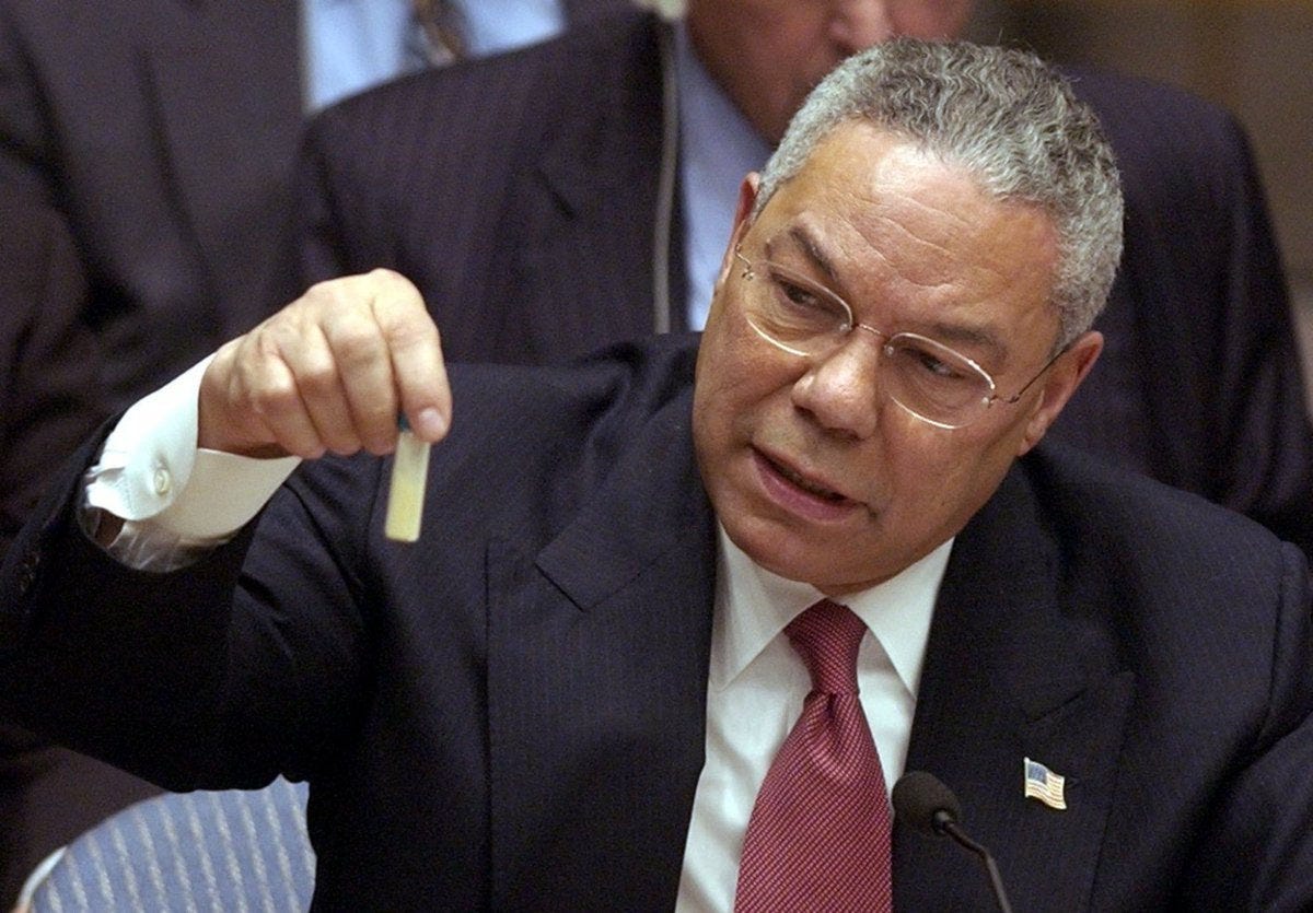Image showing Colin Powell holding a model representing anthrax during a presentation at the UN Security Council on February 5, 2003.