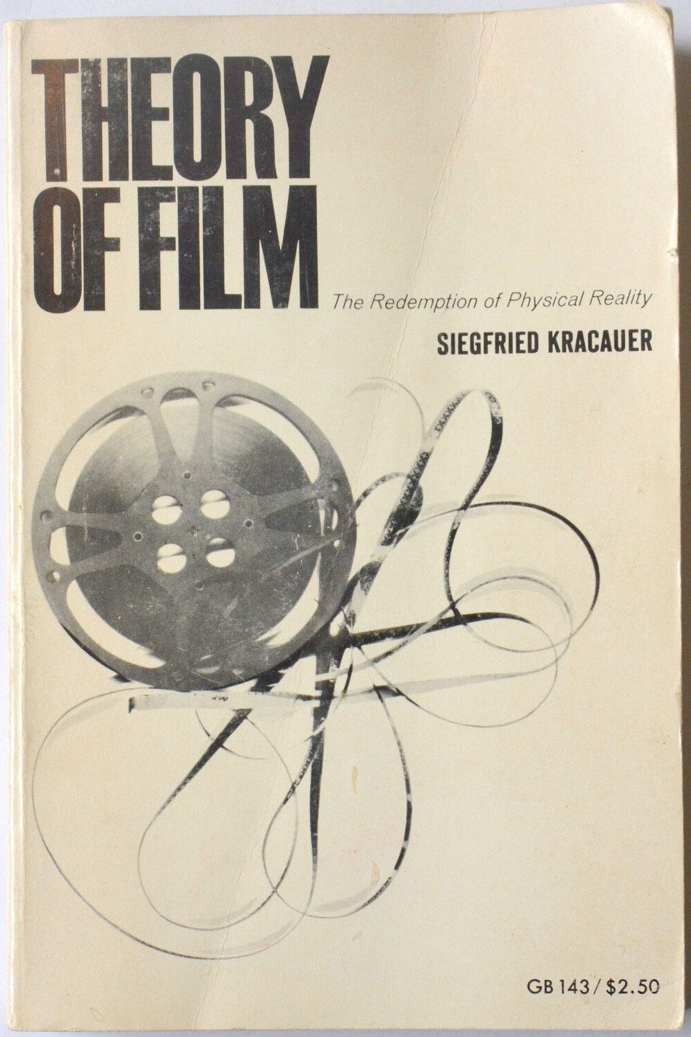 Front cover of Siegfried Kracauer's Theory of FIlm, with a photo of an unspooled roll of movie film