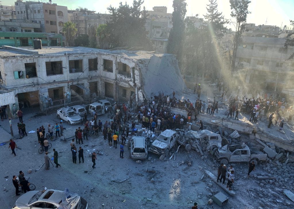 Palestinians inspect a school for victims, which was sheltering displaced people, after it was hit by an Israeli strike in Gaza City, September 1, 2024. (Hadi Daoud/apaimages)