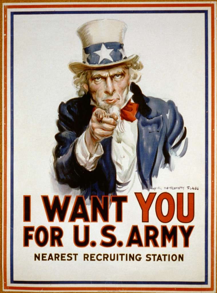 A color Army recruiting poster from World War I. The Uncle Sam character is depicted in the center of the poster dressed in a blue jacket, white shirt, red necktie and a white top hat with a blue band and white star, centered. The white bearded Uncle Sam is point his finger at the viewer with the caption below reading “Uncle Sam wants YOU for the U.S Army.” Below that is text stating “Nearest Recruiting Station.” The Uncle Sam and wording is framed in a blue line border with a double read lined border outer most. A color Army recruiting poster from World War I. The Uncle Sam character is depicted in the center of the poster dressed in a blue jacket, white shirt, red necktie and a white top hat with a blue band and white star, centered. The white bearded Uncle Sam is point his finger at the viewer with the caption below reading “Uncle Sam wants YOU for the U.S Army.” Below that is text stating “Nearest Recruiting Station.” The Uncle Sam and wording is framed in a blue line border with a double read lined border outer most.