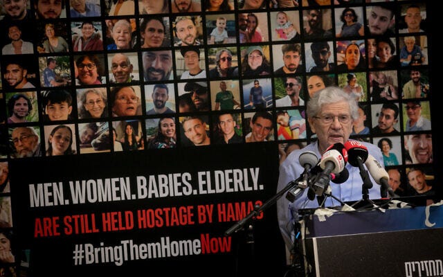 Former Supreme Court chief justice Aharon Barak speaks on November 3, 2023, at a press conference with families whose loved ones have been abducted by Hamas terrorists and have been held in Gaza since October 7. (Miriam Alster/FLASH90)