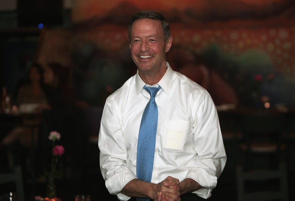 A smiling Martin o'Malley, his blue tie loosened and his shirt sleeves rolled up.