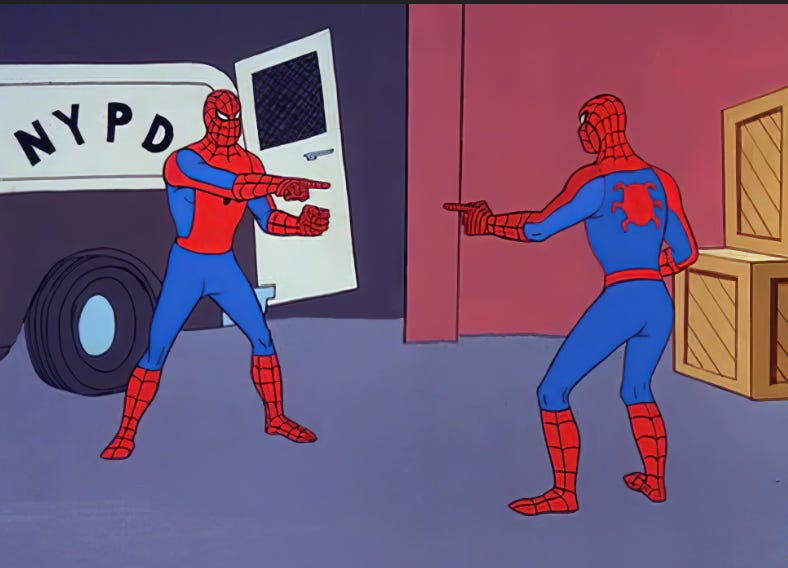  Spidermen pointing at each other