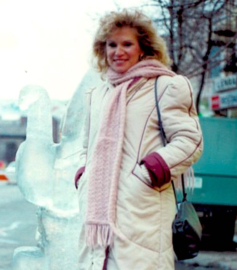 Monique Sadler standing in winter coat in front of ice sculpture in Milwaukee