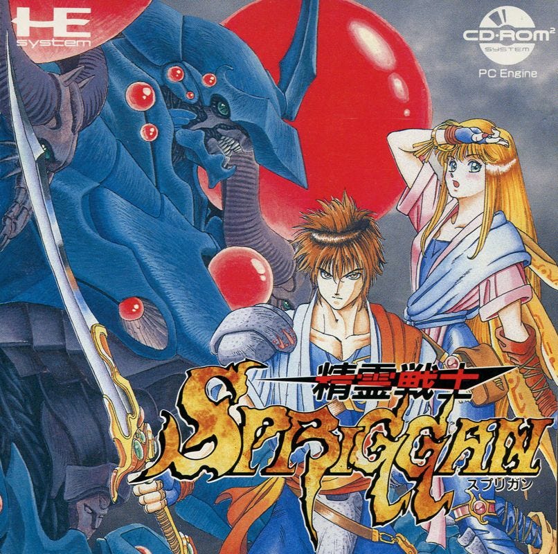 The cover art for the PC Engine CD Japan-exclusive Seirei Senshi Spriggan. The only English word in the title is Spriggan, in a highly stylized font. Shown on the cover is a mecha in the background, with two human characters, a man and a long-haired blonde woman, in the foreground. The man has a sword, which does not come into play in the story, but hey, it all looks cool.
