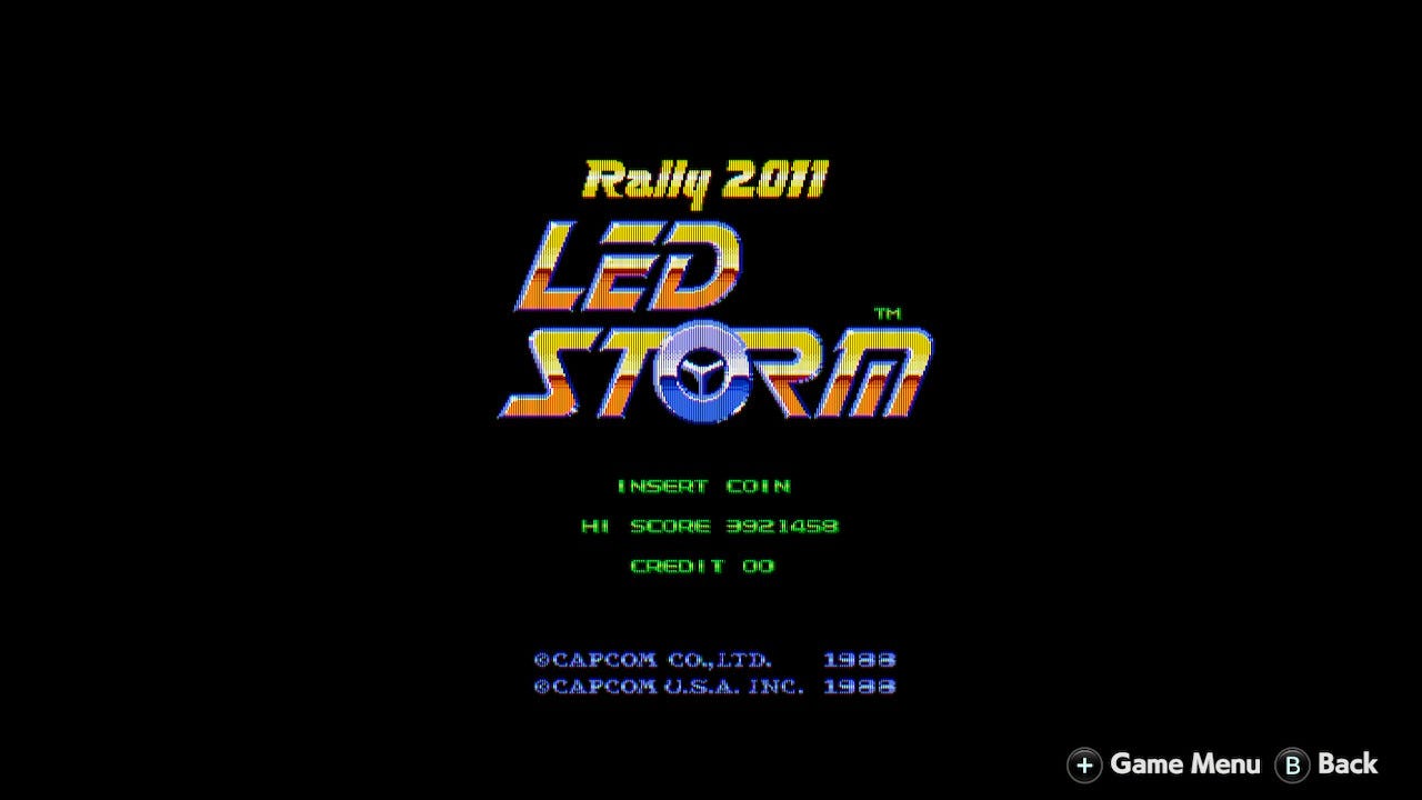 The title screen for the arcade version of Rally 2011 LED Storm. The "o" in storm is meant to be a steering wheel. The title screen has yellow, metallic font for the title, green text for the standard "Insert Coin" and credit text, and is otherwise a black, blank screen outside of the credits for Capcom.