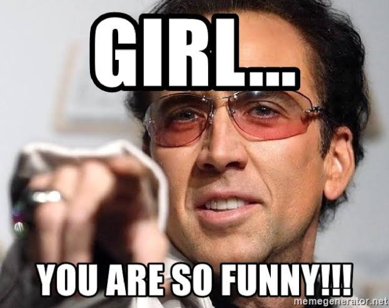 Nicholas Cage pointing with caption GiRL You are so funny!