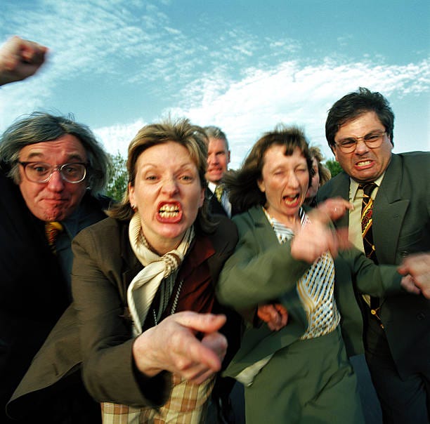 group of business people gesturing and pulling faces (blurred motion) - group of business people yelling stock pictures, royalty-free photos & images