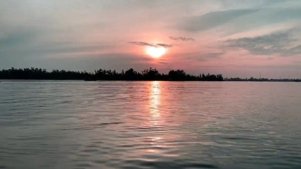 Photo of sun setting over water in the shape of a heart from Mother Nature. Photo of sun setting over water in the shape of a heart from Mother Nature.