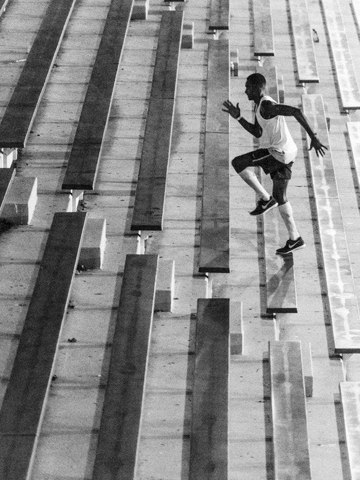 This may contain: a man riding a skateboard down the side of a ramp