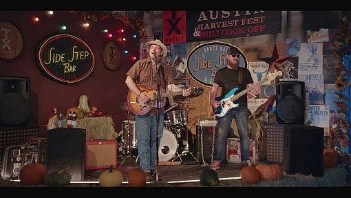 Country band plays at Walker Harvest Fest.