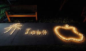 Steve Jobs Apple shrines: Cupertino, California: Students used candles to create the Apple logo