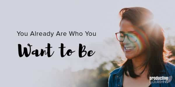 A woman in glasses is smiling. The sun shines behind her. Text Overlay: You Already Are Who You Want To Be