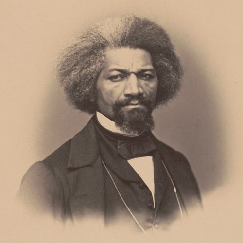 Portrait of Frederick Douglass in a suit and with graying hair, 1862