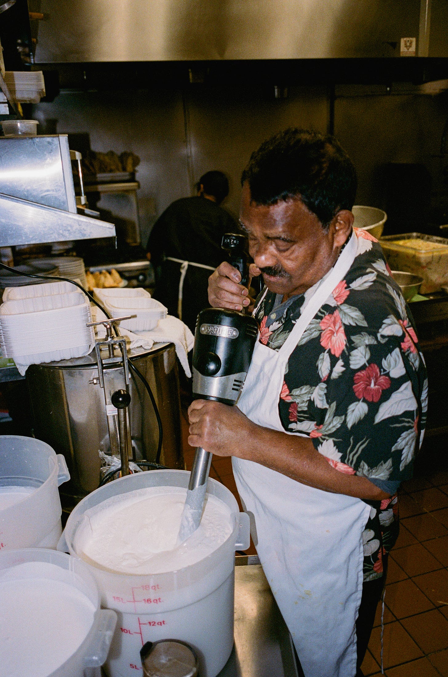 Making dosa batter for Mayura