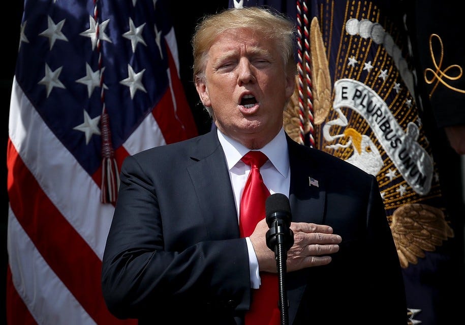 WASHINGTON, DC - JUNE 05:  U.S. President Donald Trump sings the national anthem during a "Celebration of America" event on the south lawn of the White House June 5, 2018 in Washington, DC. The event, originally intended to honor the Super Bowl champion Philadelphia Eagles, was changed after the majority of the team declined to attend the event due to a disagreement with Trump over NFL players kneeling during the national anthem.  (Photo by Win McNamee/Getty Images)