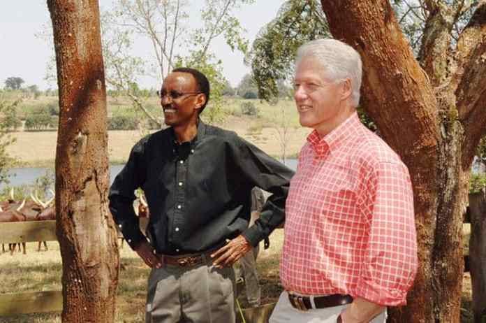 A few men standing next to a tree

Description automatically generated