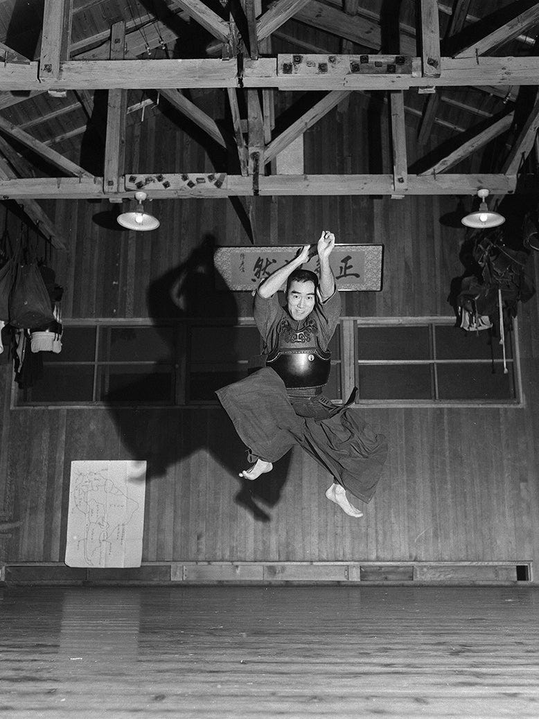 Yukio Mishima jumping in Japan