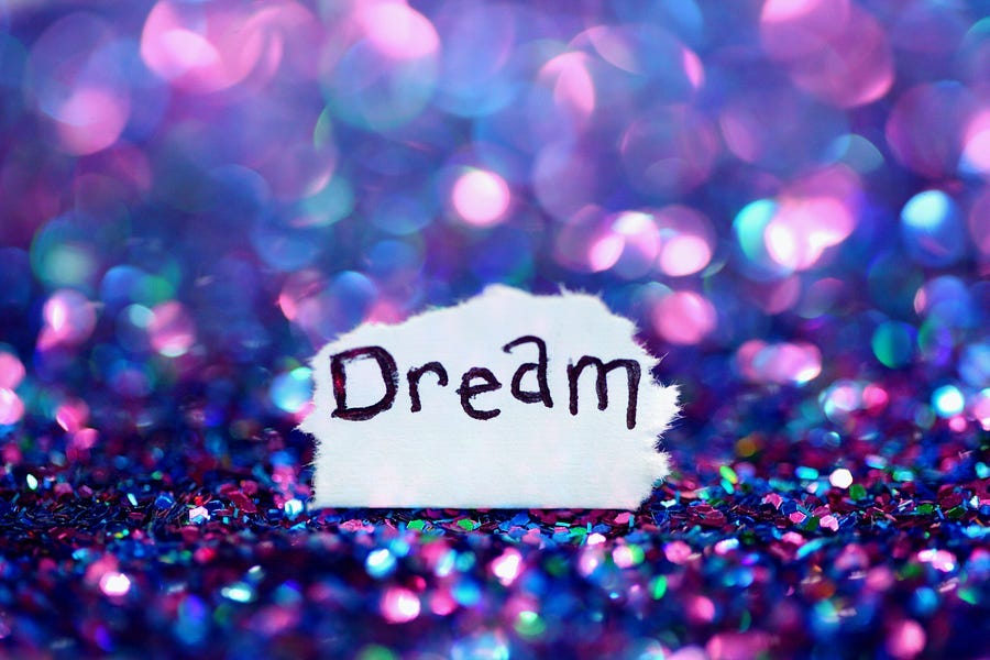 the word “Dream” with a colored background.