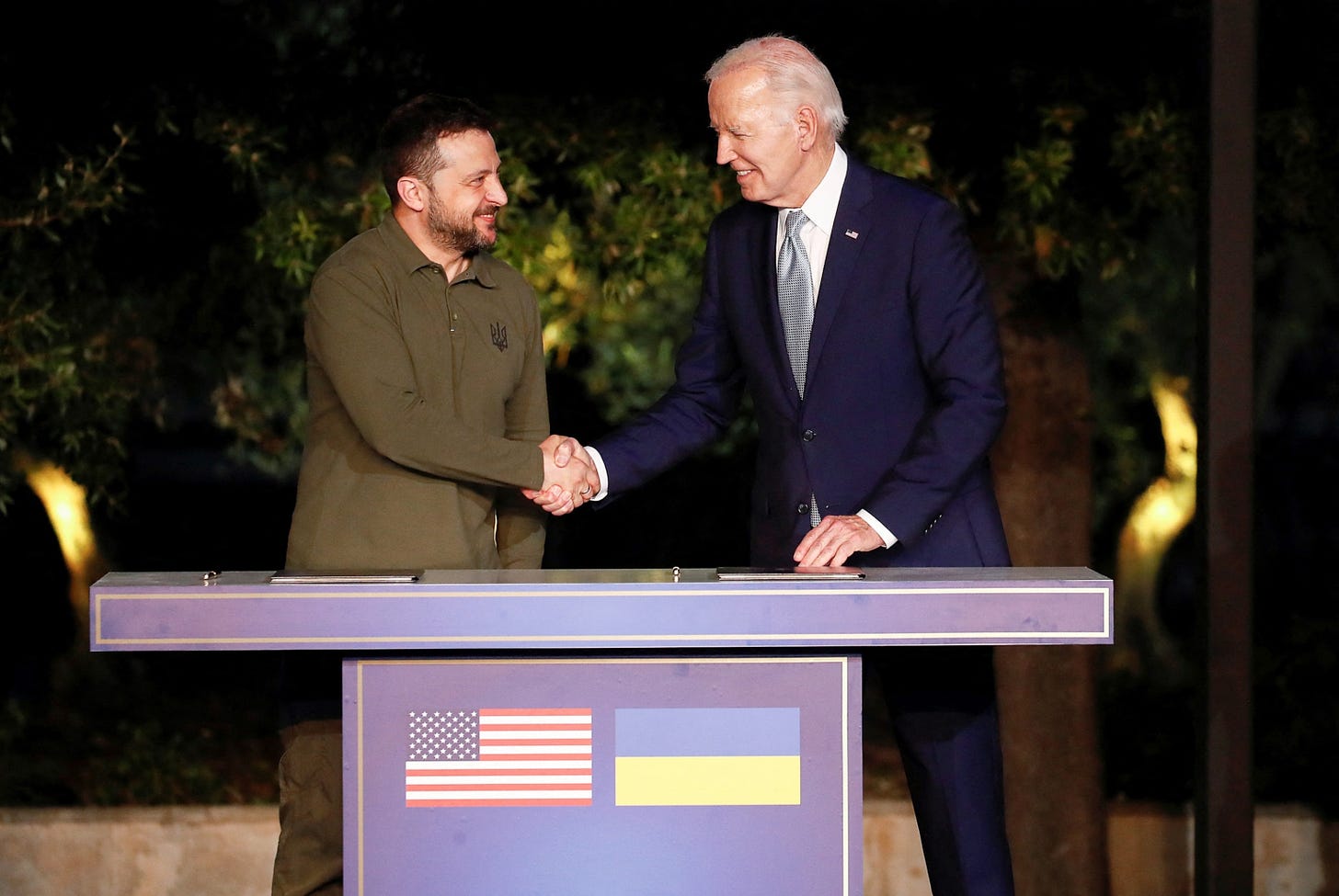 PHOTO: President Joe Biden and Ukrainian President Volodymyr Zelenskiy shake hands, during a press conference, on the day of a bilateral meeting on the sidelines of the G7 summit, in Fasano, Italy, June 13, 2024.